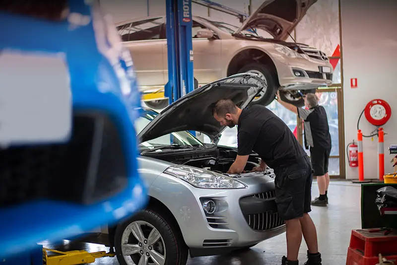 A car being serviced at a Croydon auto shop, helping local drivers understand the right service intervals.